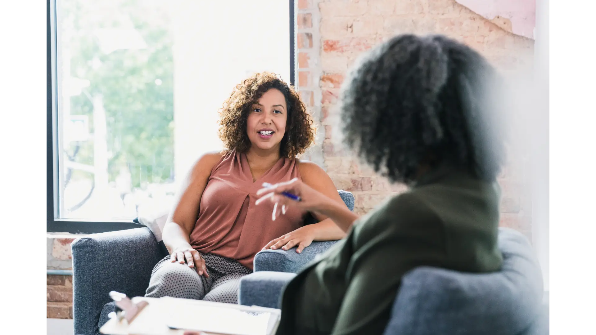 Specialist gynaecologist in consultation with a patient