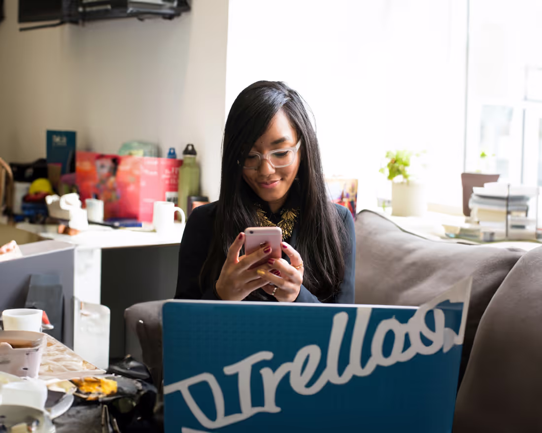 Woman working at home with her laptop, supported between appointments